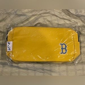 Yellow and blue Boston Red Sox  (or just a B) never opened fanny pack.